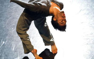 A dancer bending backwards